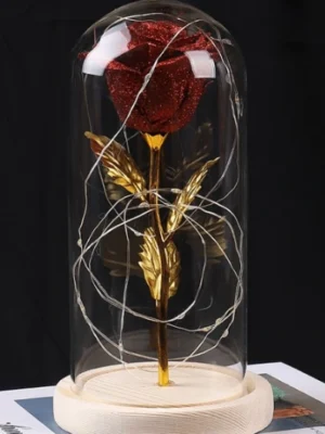 Rose artificielle dans cloche paillettes rouges