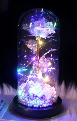Rose artificielle dans cloche couple